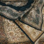 Close-up of luxurious handmade Oriental rugs with intricate patterns and rich colors, ideal for professional rug cleaning and restoration services in Dallas-Fort Worth